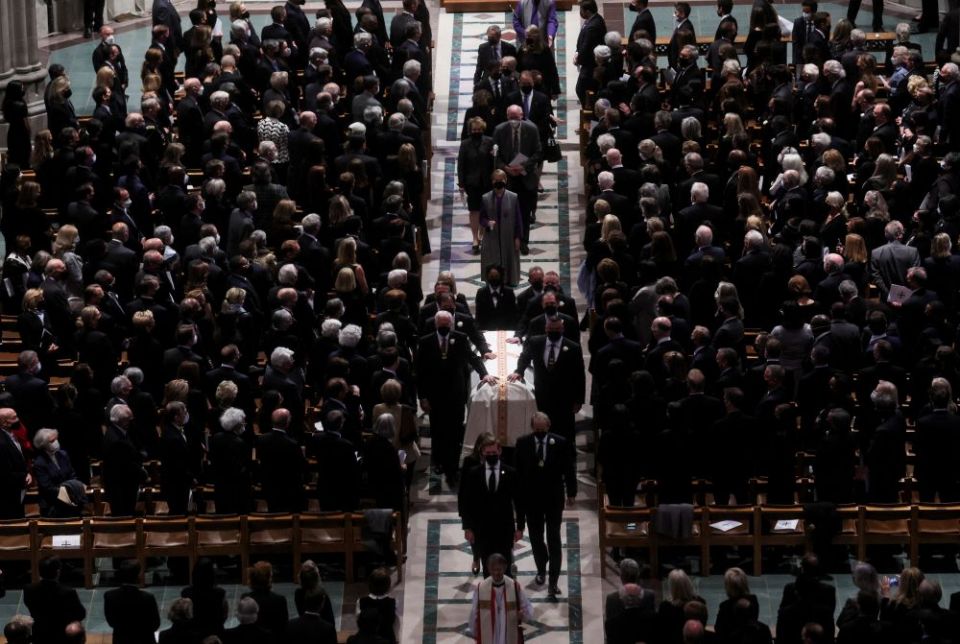 Mourners at the Washington National Cathedral in Washington stand April 27 as the casket of former Secretary of State Madeleine Albright is carried during a funeral procession. Albright, the first woman to serve as U.S. secretary of state, died March 23.