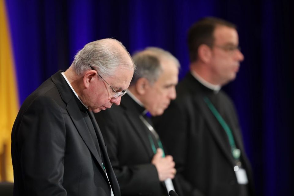 U.S. Conference of Catholic Bishops leaders pray during their 2019 fall general assembly in Baltimore. (CNS/Bob Roller)