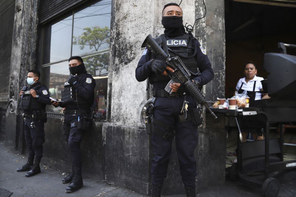 Heavily armed police guard the streets as part of a state of exception in downtown San Salvador, El Salvador, March 27, 2022.