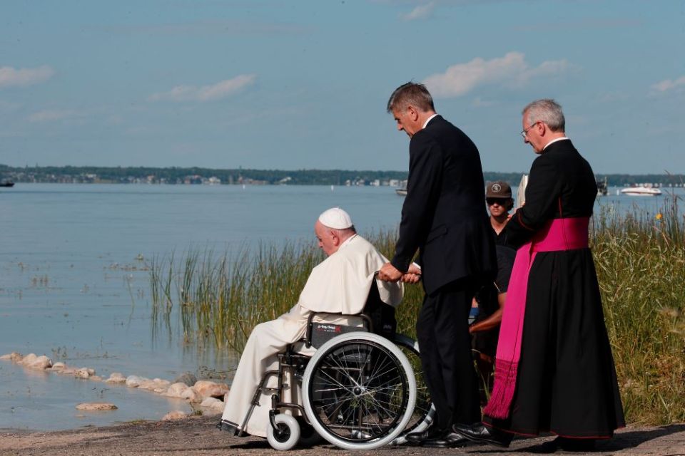 Pope Francis visits the lake as he participates in the pilgrimage and Liturgy of the Word in Lac Ste. Anne, Alberta, July 26. The visit came during his weeklong trip to Canada. (CNS/Paul Haring)