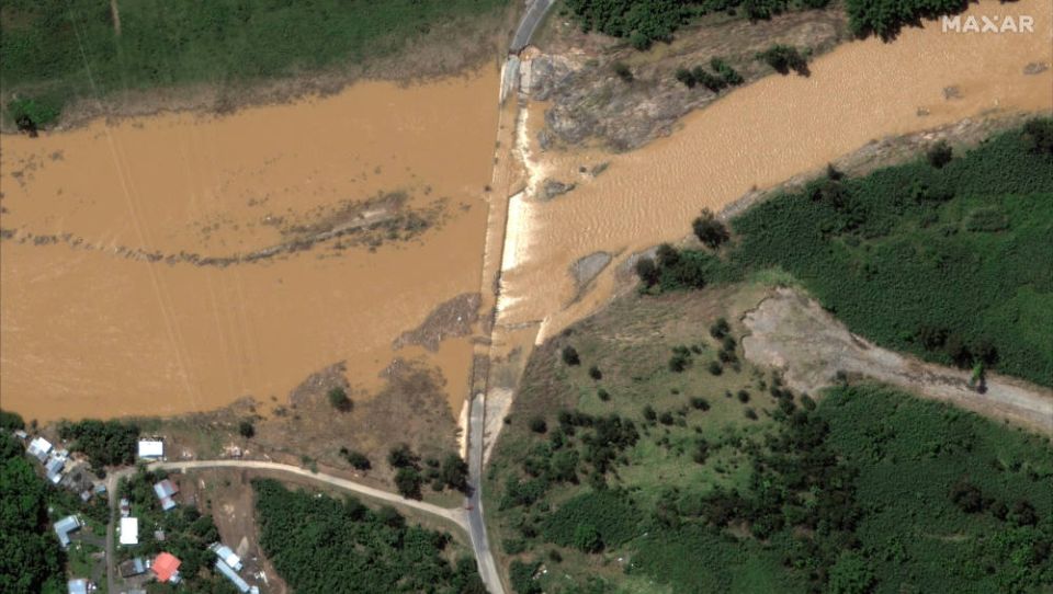 A satellite image shows a flooded bridge in the aftermath of Hurricane Fiona, in Arecibo, Puerto Rico, Sept. 21, 2022. (CNS photo/courtesy Maxar Technologies via Reuters)
